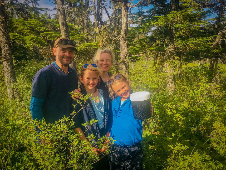 Family blueberry picking in the muskeg of Chichagof Island